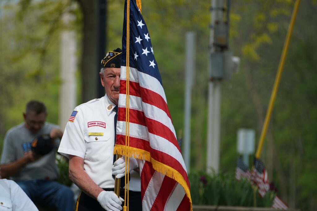Memorial Day veteran holding a flag